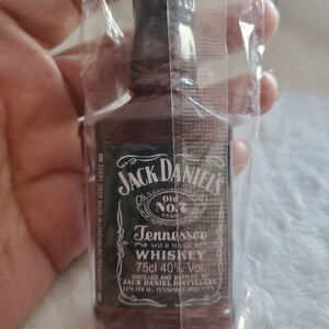 This that dark Jack Daniel 5 inch Bottle opener Magnet